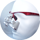 ErgonoptiX Comfort Galilean Flip-Up surgical and dental loupes on a Rim style frame- magnification 2.5x - 3.0x - 3.5x